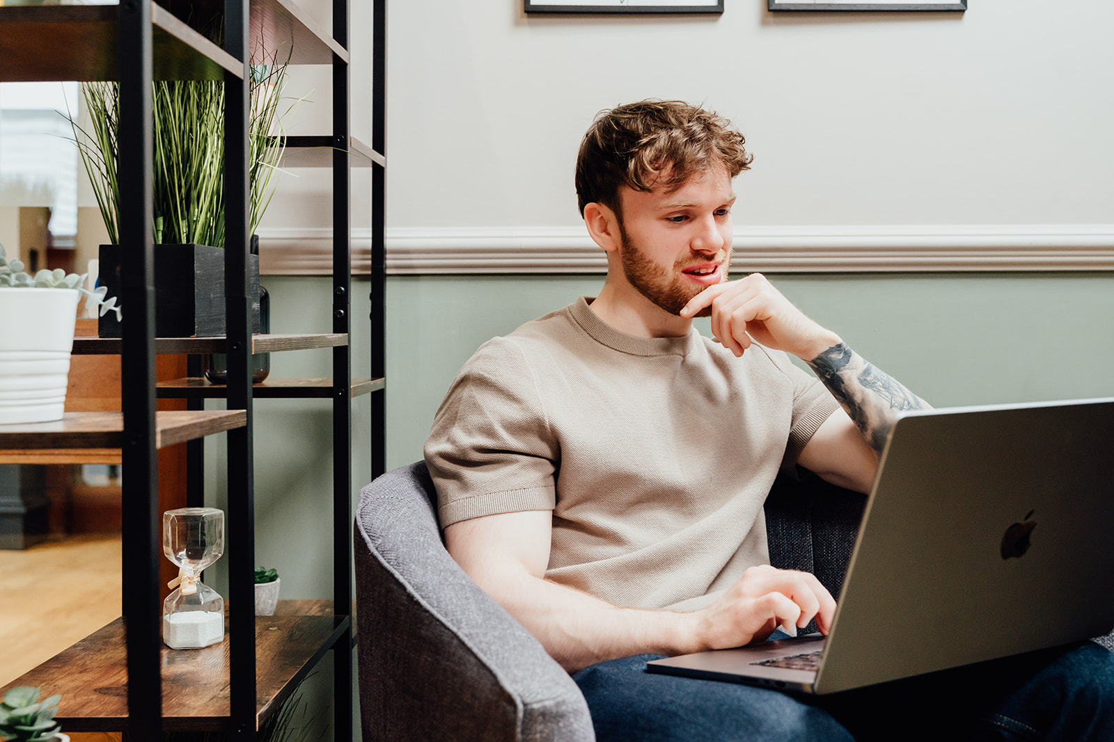Callum Healey working on a laptop during an AI consultancy build.